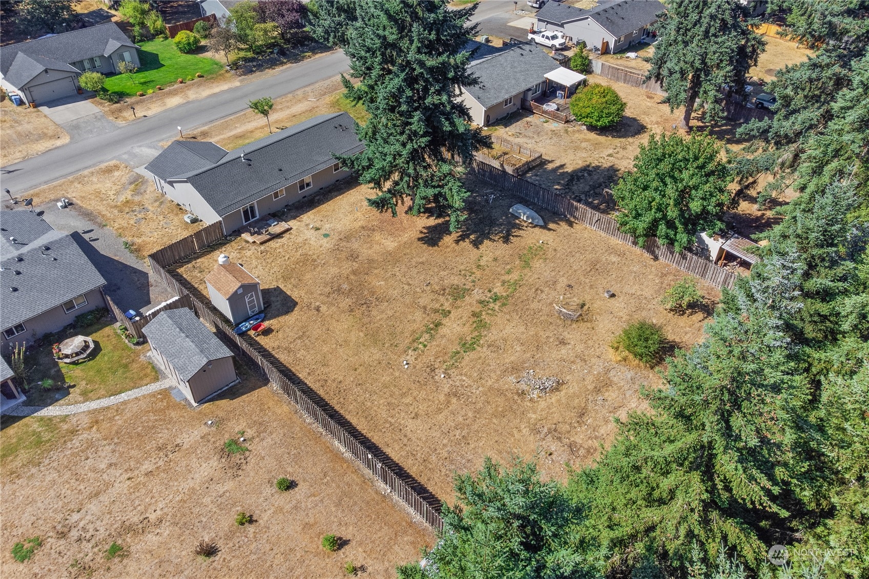 5412 187th Court Southwest Rochester, WA 98579 - Photo 32 of 37 an aerial view of house with yard