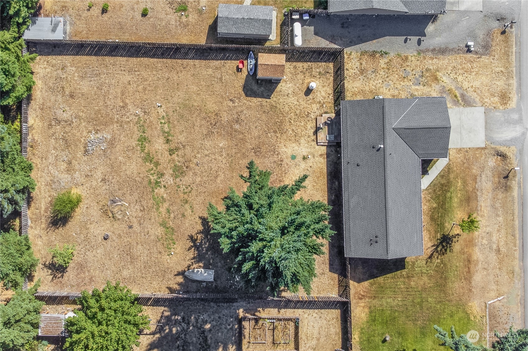 5412 187th Court Southwest Rochester, WA 98579 - Photo 33 of 37 an aerial view of residential house with outdoor space