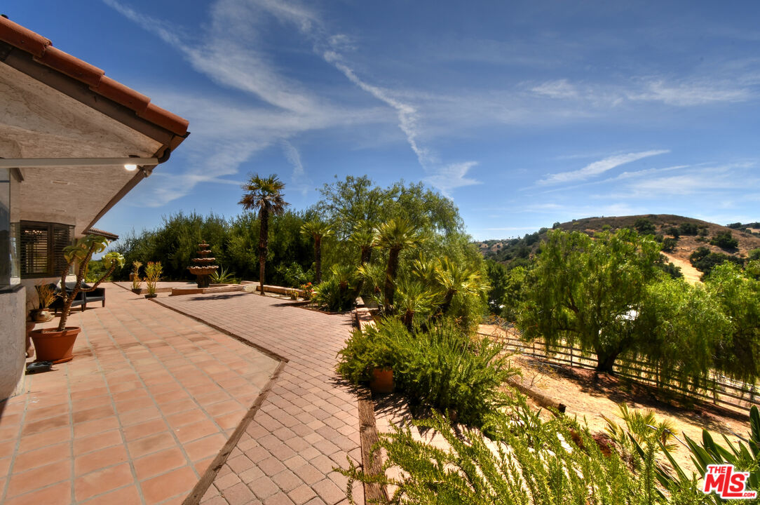 24926 Jim Bridger Road Hidden Hills, CA 91302 - Photo 17 of 40 a view of a backyard