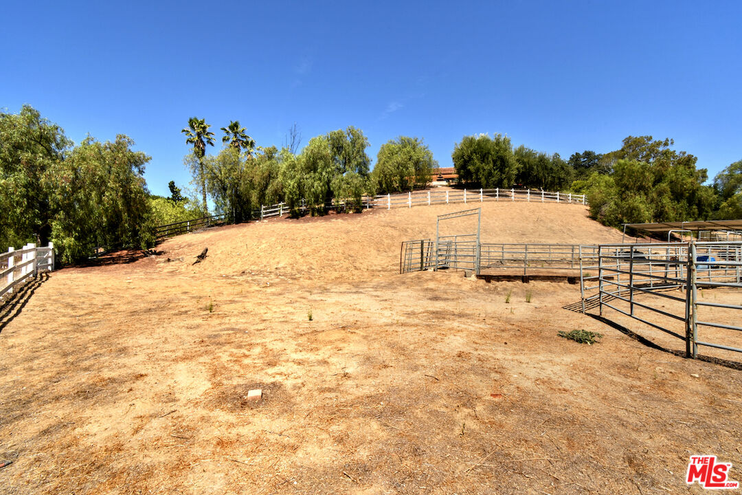 24926 Jim Bridger Road Hidden Hills, CA 91302 - Photo 36 of 40 a view of a terrace view