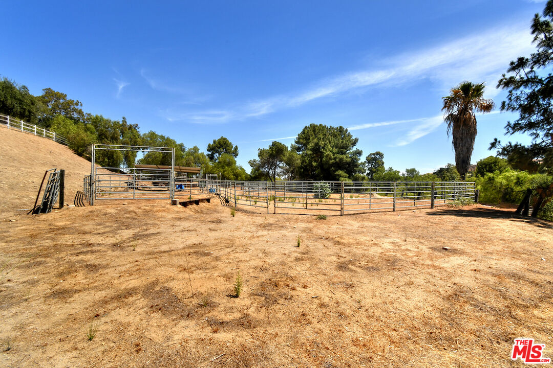24926 Jim Bridger Road Hidden Hills, CA 91302 - Photo 8 of 40 a view of a lake with houses