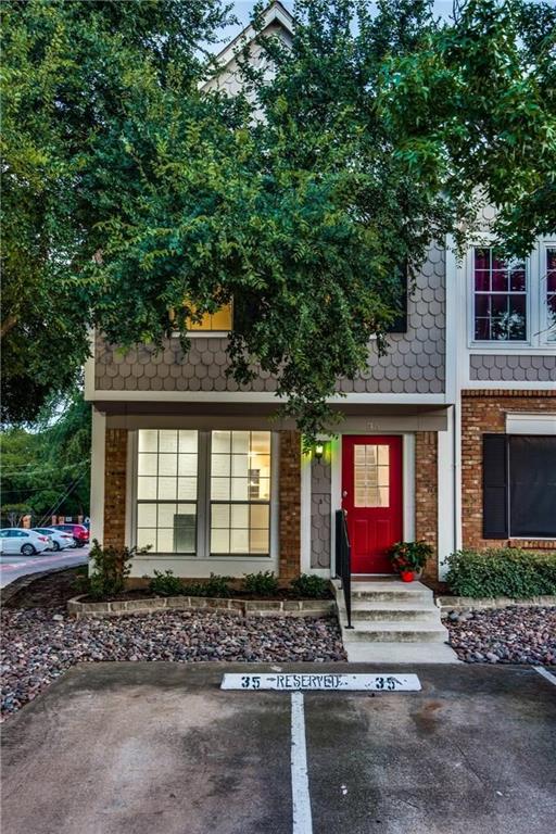 35 Abbey Road Euless, TX 76039 - Photo 2 of 25 a front view of a house with a yard