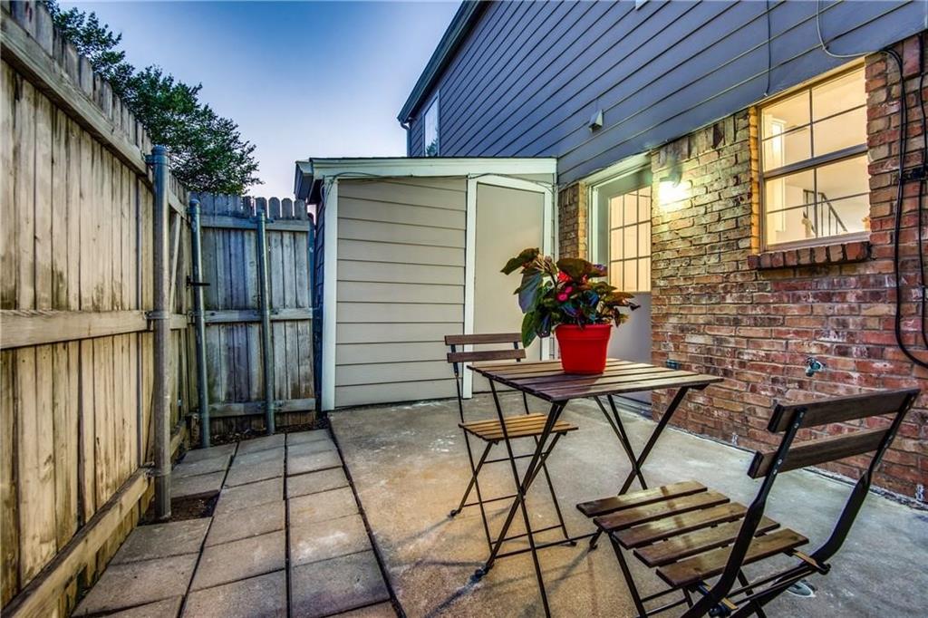 35 Abbey Road Euless, TX 76039 - Photo 4 of 25 a view of a chairs and table in the patio with a backyard