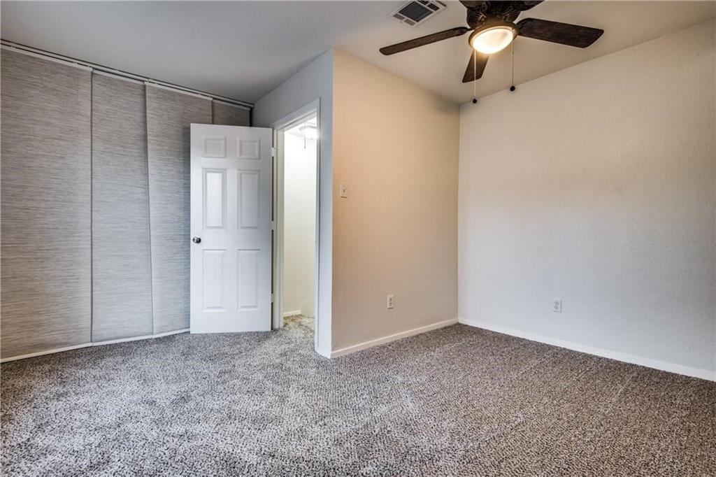 35 Abbey Road Euless, TX 76039 - Photo 7 of 25 an empty room with fan