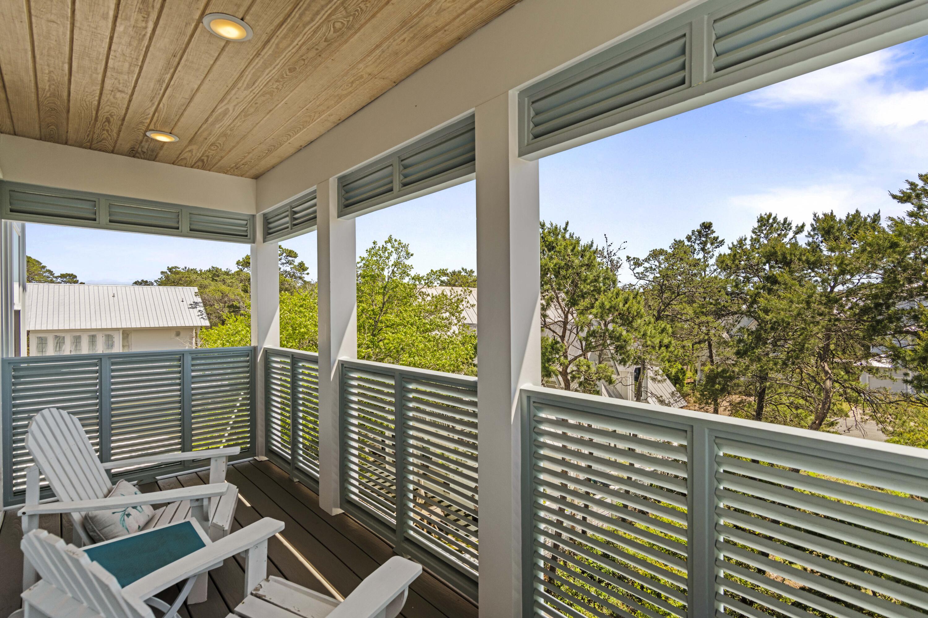 48 Lake Mist Ln Inlet Beach Inlet Beach, FL 32461 - Photo 43 of 78 a view of a balcony with chairs