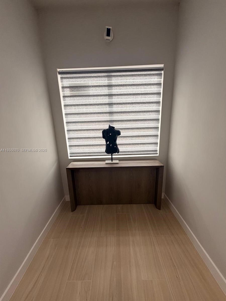2436 Southwest 7th Street, Unit 7 Miami, FL 33135 - Photo 13 of 17 a view of a room with a small cabin