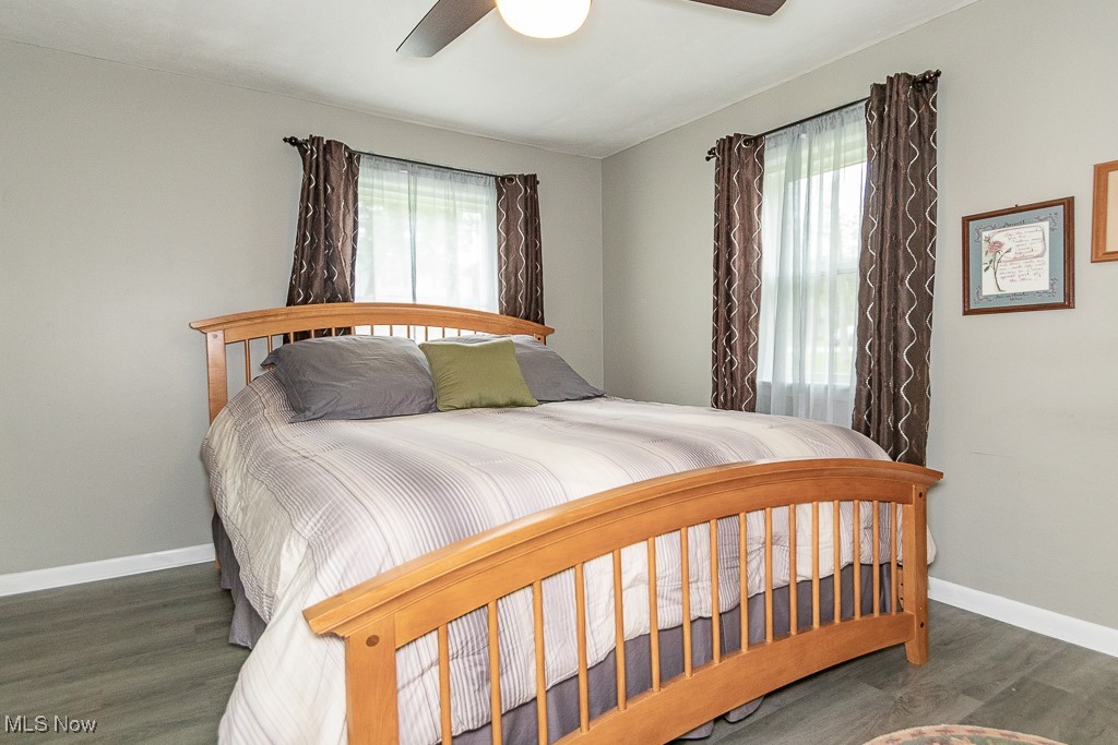 9479 Hoose Road Mentor, OH 44060 - Photo 12 of 20 Bedroom with ceiling fan and vinyl flooring. Neutral decor.