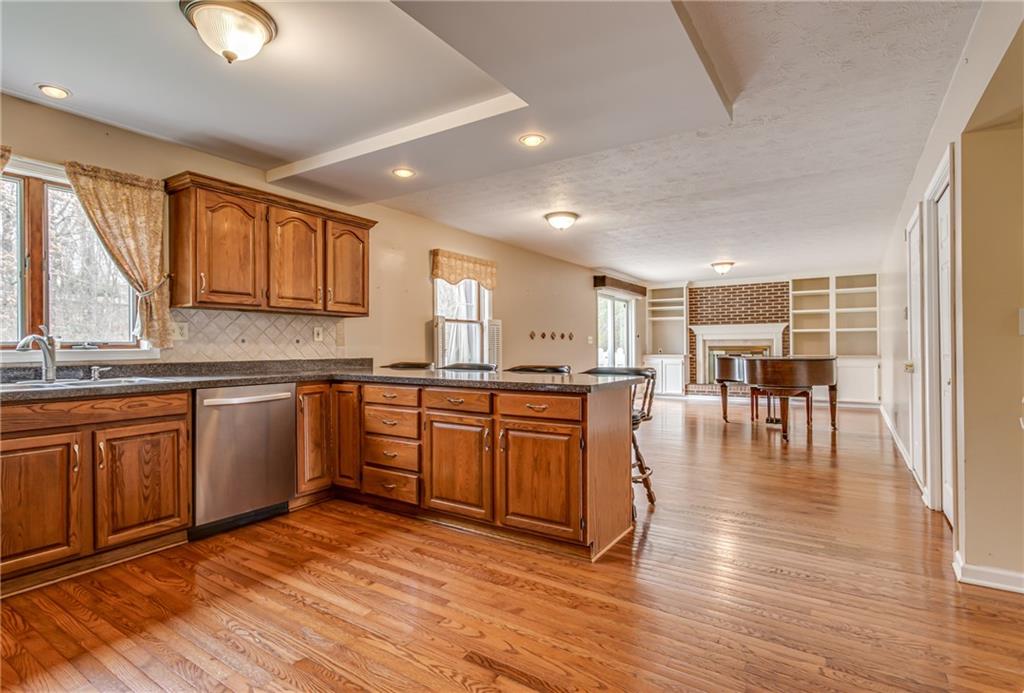 148 Mary Reed Road Baden, PA 15005 - Photo 3 of 25 Great open format between the kitchen and family room.