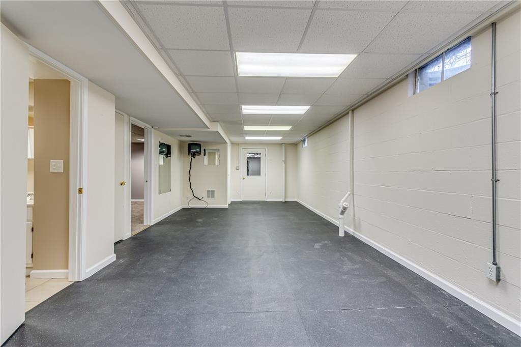 148 Mary Reed Road Baden, PA 15005 - Photo 5 of 25 Check out this room! Exercise nonslip flooring tiles are already installed so your workout room is ready and waiting! Of course this room can be used for multiple purposes. Isn't it nice to have options?