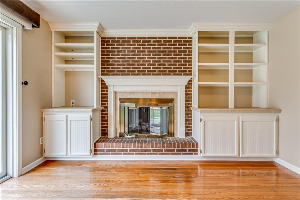 148 Mary Reed Road Baden, PA 15005 - Photo 8 of 25 Beautiful built-ins in family room. Gas log fireplace to keep the room nice and cozy on chilly nights.