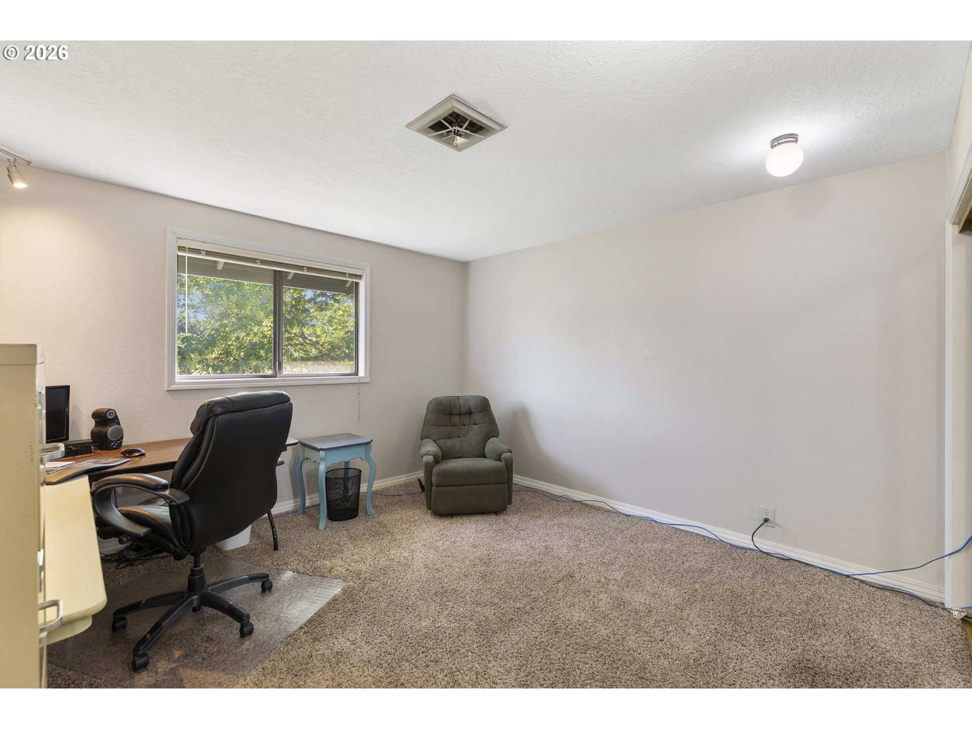 4515 Cordon Road Northeast Salem, OR 97305 - Photo 22 of 48 a living room with furniture and a window
