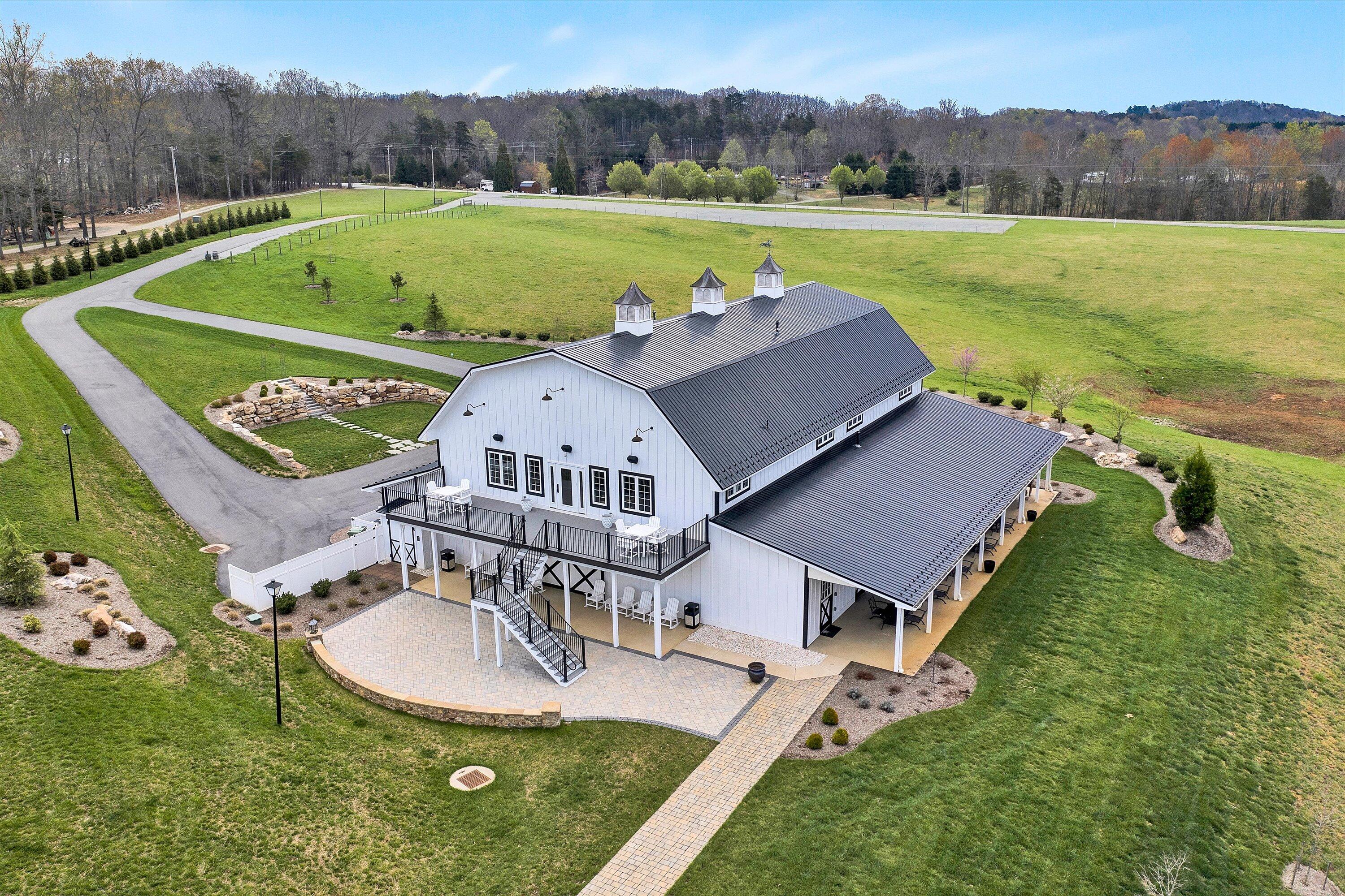 9945 Brooks Mill Road Wirtz, VA 24184 - Photo 1 of 50 a view of a swimming pool and mountains in the background