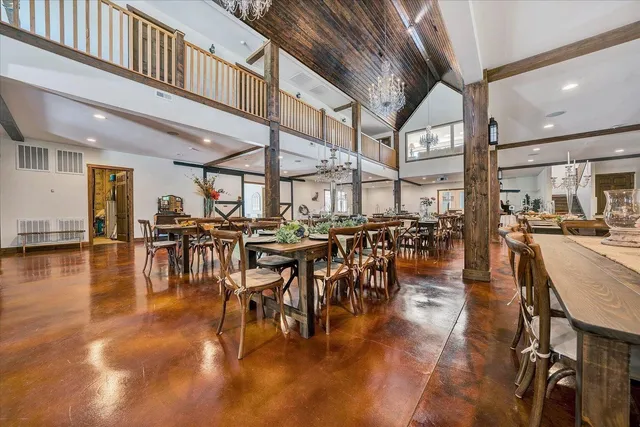 a large living room with lots of furniture