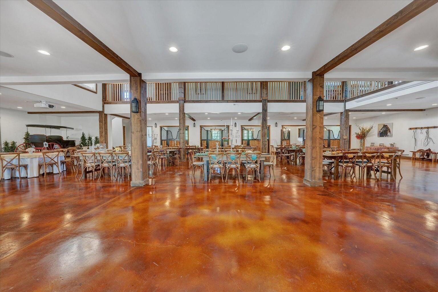 9945 Brooks Mill Road Wirtz, VA 24184 - Photo 31 of 50 a living room with lots of furniture and a table