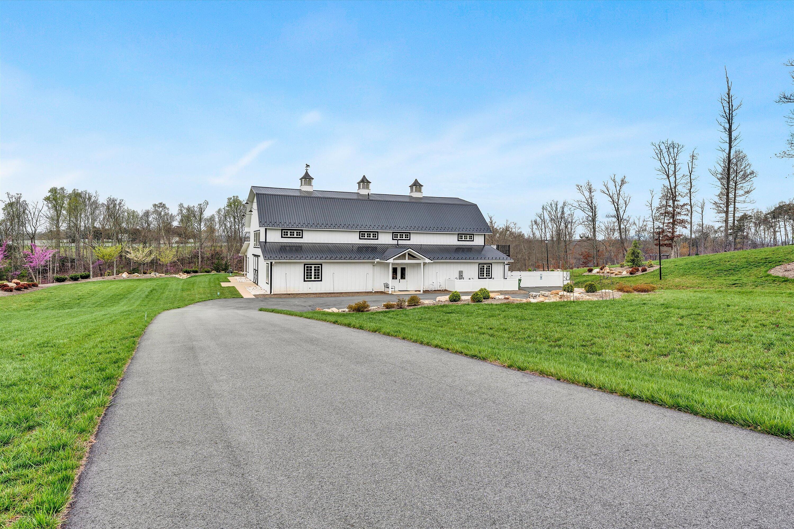9945 Brooks Mill Road Wirtz, VA 24184 - Photo 34 of 50 a view of a big yard with houses