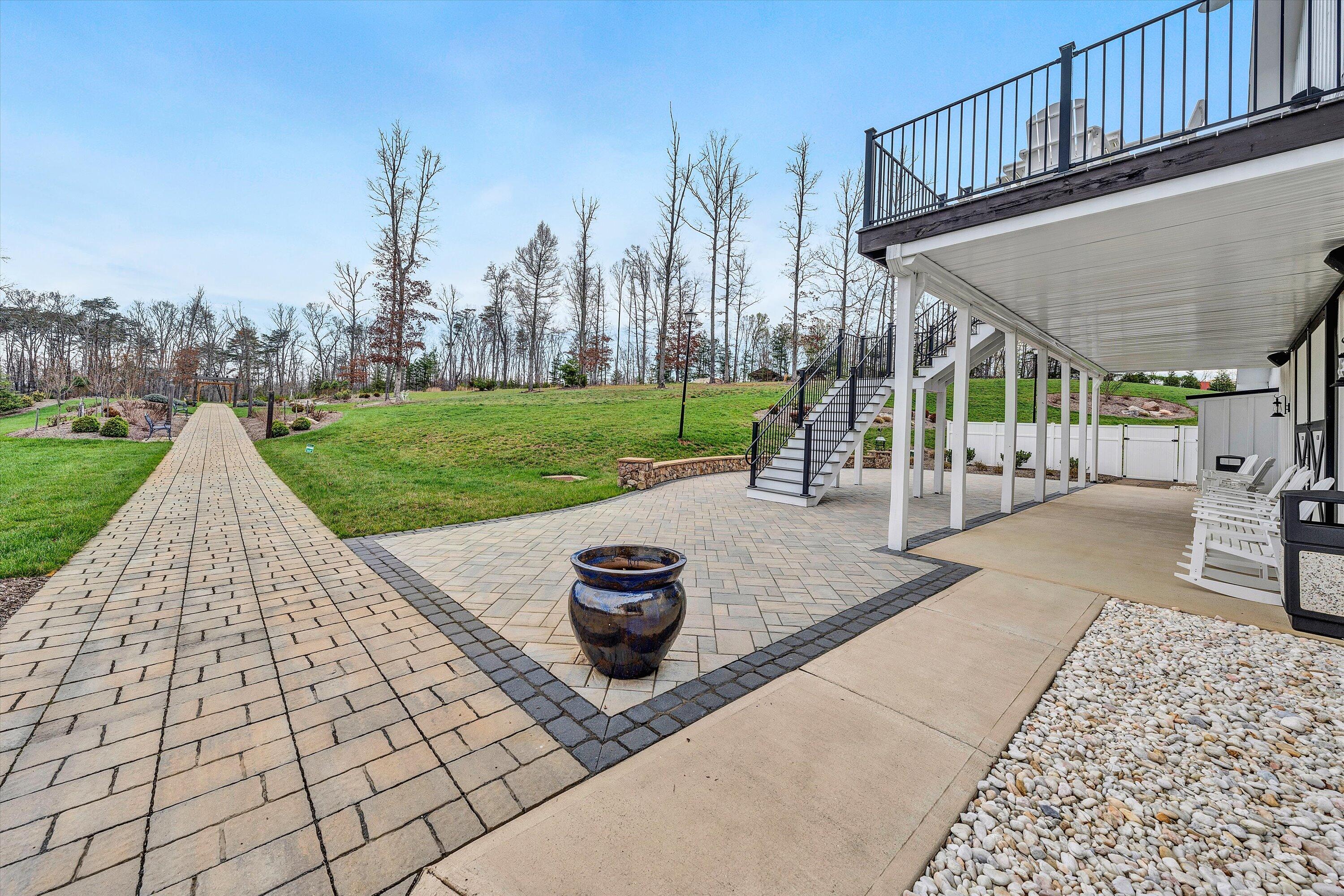 9945 Brooks Mill Road Wirtz, VA 24184 - Photo 42 of 50 a view of a patio with a table and chairs