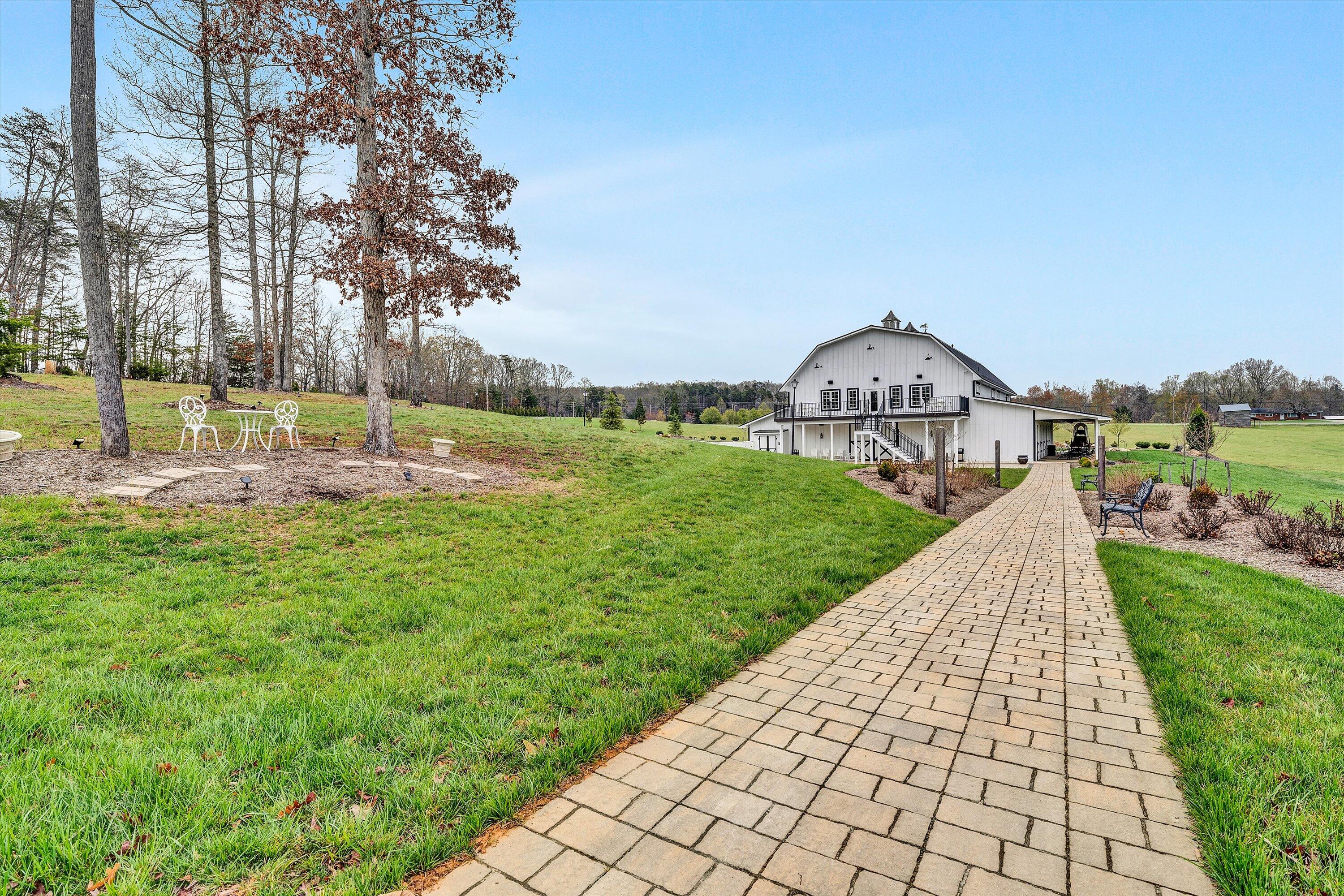 9945 Brooks Mill Road Wirtz, VA 24184 - Photo 49 of 50 a view of a garden with a slide