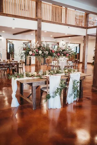 a view of dining room with lots of furniture and wooden floor