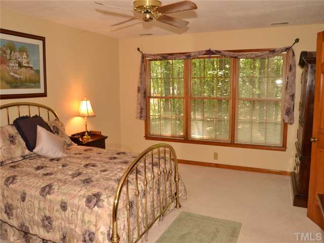 5304 Deep Valley Run Raleigh, NC 27606 - Photo 12 of 25 Inviting master bedroom has triple windows and plenty of room for large furnishings. Master Bedroom