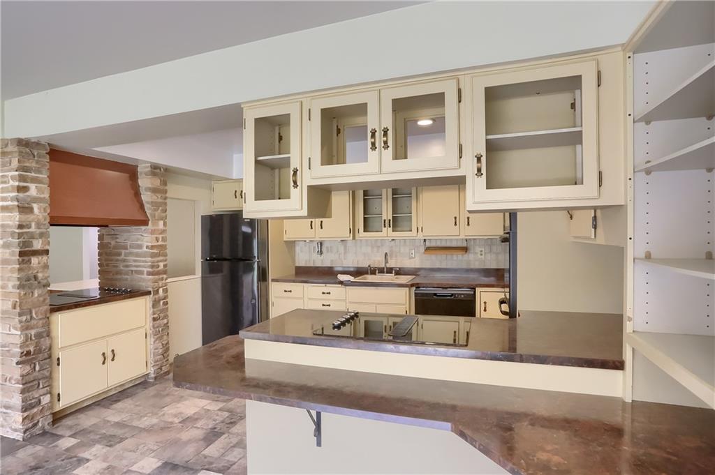 566 Zeigler Road Rochester, PA 15074 - Photo 22 of 50 a kitchen with stainless steel appliances granite countertop a refrigerator and stove