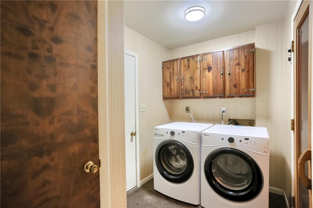 566 Zeigler Road Rochester, PA 15074 - Photo 33 of 50 a utility room with dryer and washer