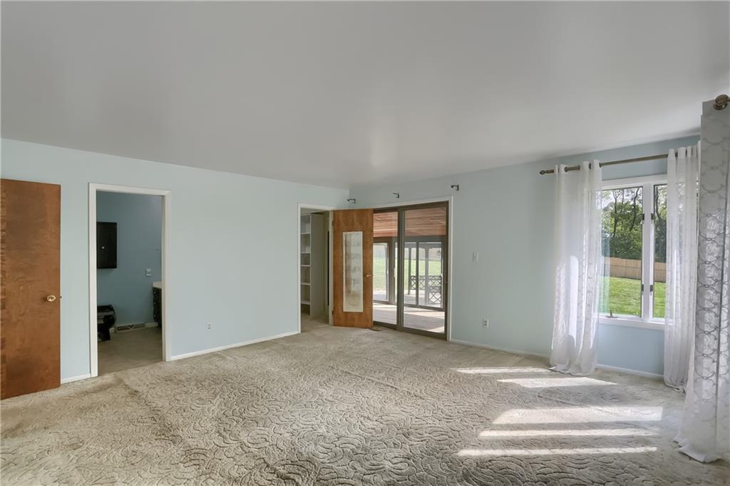 566 Zeigler Road Rochester, PA 15074 - Photo 34 of 50 a view of an empty room with a window