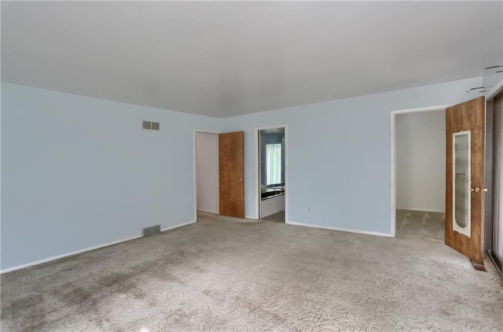 566 Zeigler Road Rochester, PA 15074 - Photo 35 of 50 a view of an empty room with a window