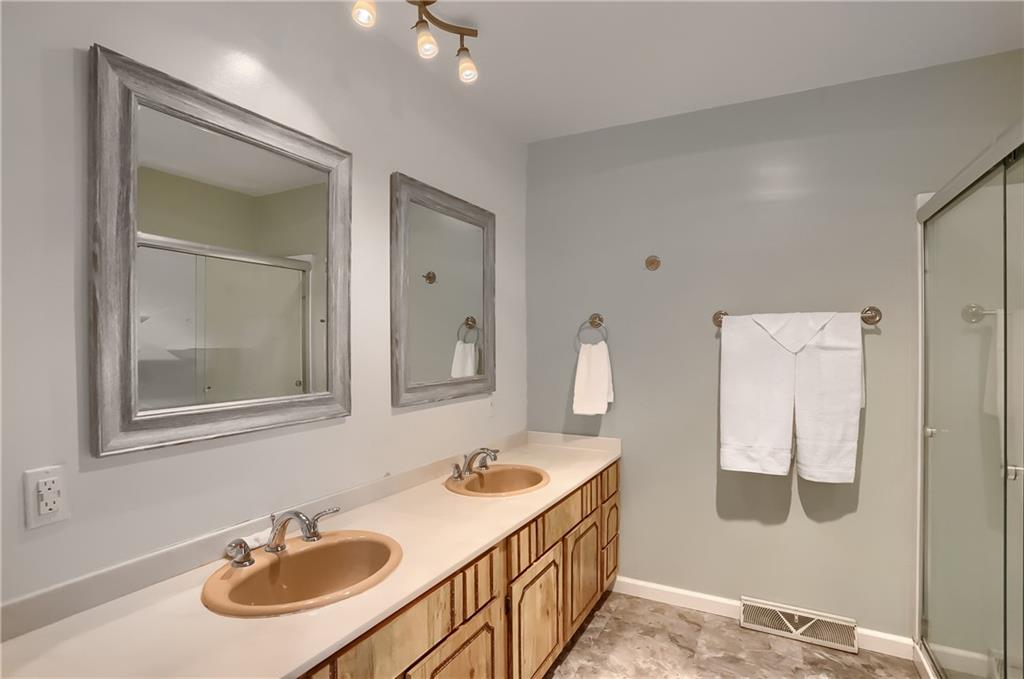 566 Zeigler Road Rochester, PA 15074 - Photo 41 of 50 a bathroom with a sink and a mirror