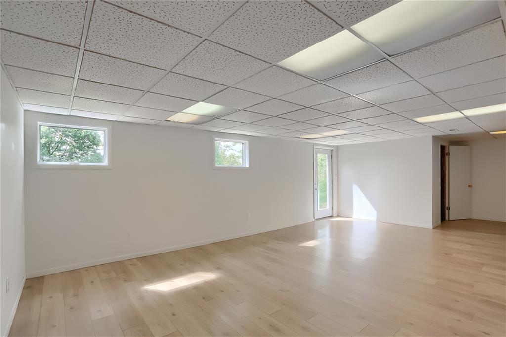 566 Zeigler Road Rochester, PA 15074 - Photo 43 of 50 a view of an empty room with a window