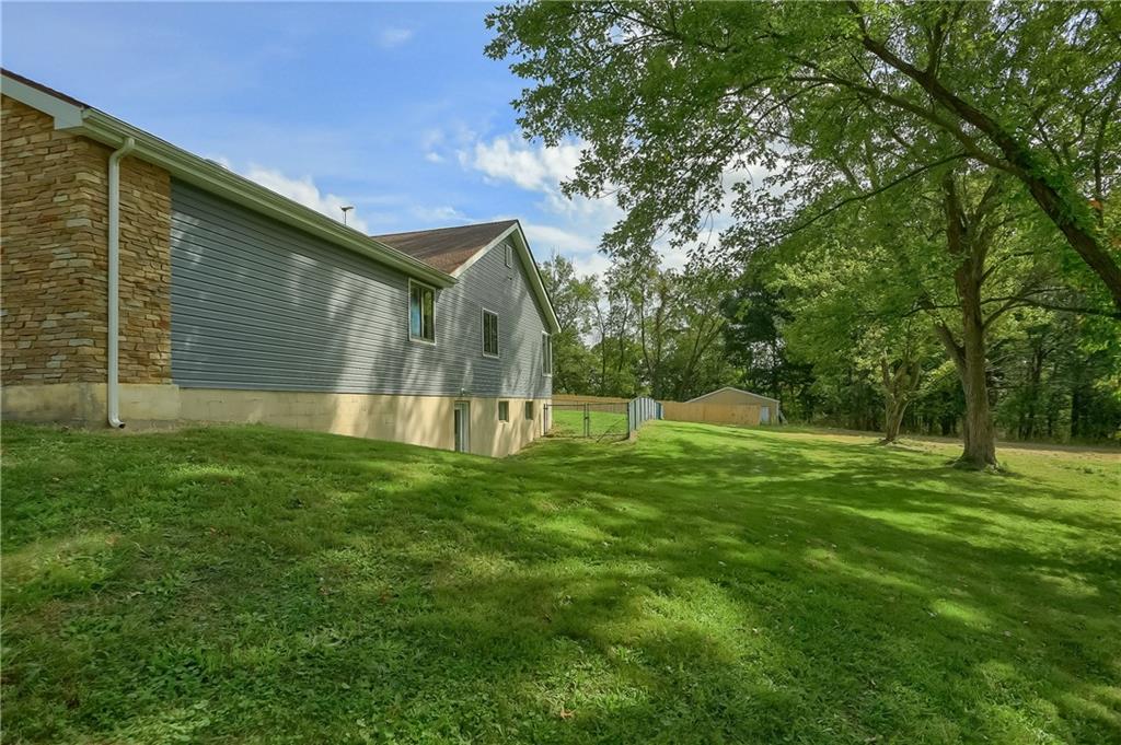 566 Zeigler Road Rochester, PA 15074 - Photo 5 of 50 a view of a house with a backyard