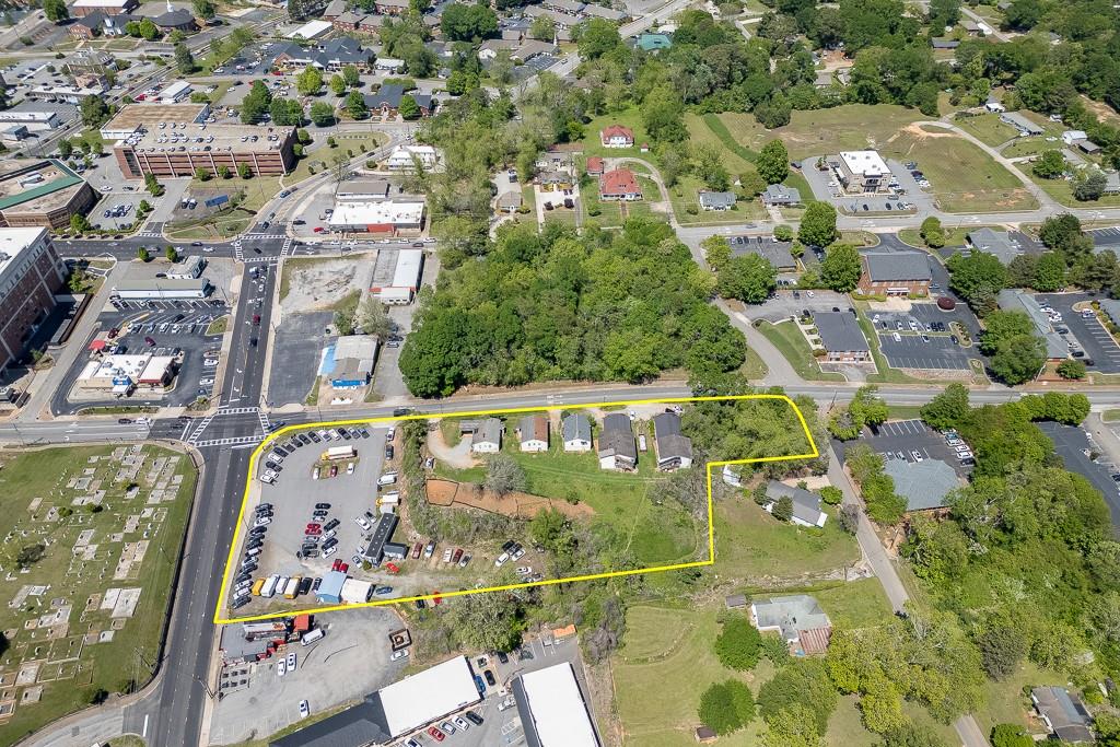 116 East Maple Street Cumming, GA 30040 - Photo 4 of 15 an aerial view of a city