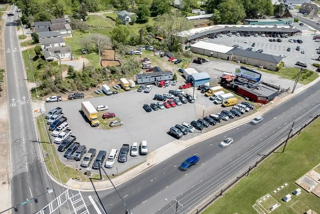 an aerial view of a swimming pool and outdoor space