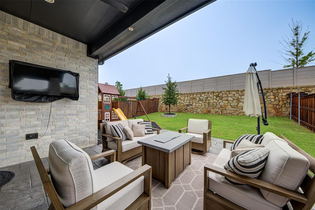 162 Palo Duro Bend Rhome, TX 76078 - Photo 23 of 25 Amazing backyard with extended covered patio