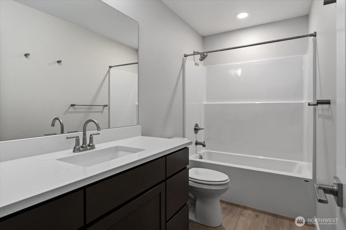 36 Simpson Street Mansfield, WA 98830 - Photo 17 of 28 a bathroom with a sink toilet tub and shower