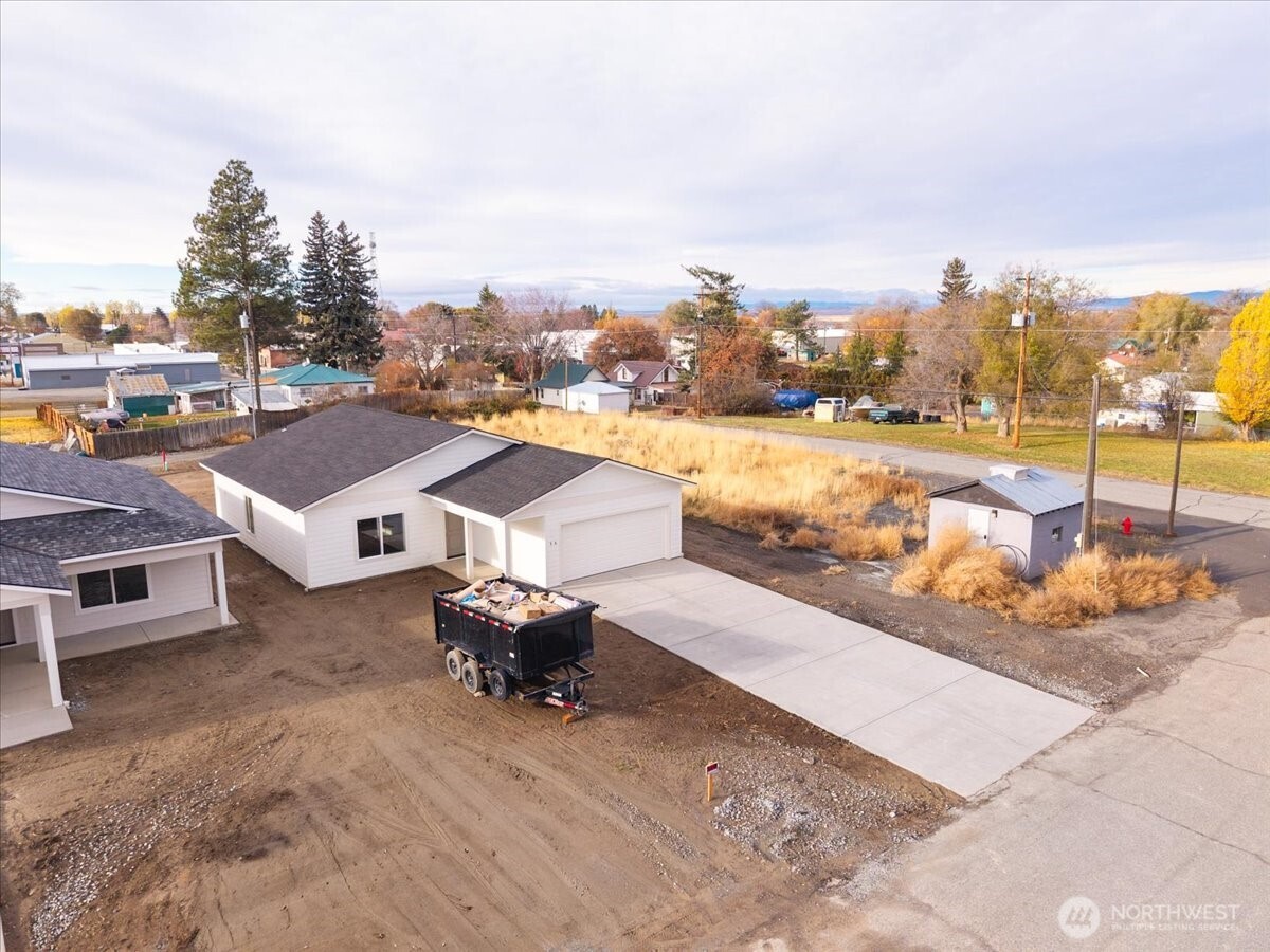 36 Simpson Street Mansfield, WA 98830 - Photo 2 of 28 a view of a terrace with lawn chairs