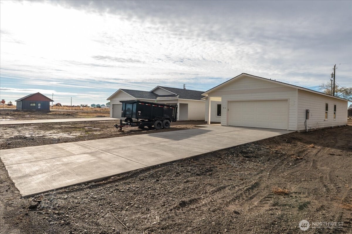 36 Simpson Street Mansfield, WA 98830 - Photo 3 of 28 a view of a house with a yard