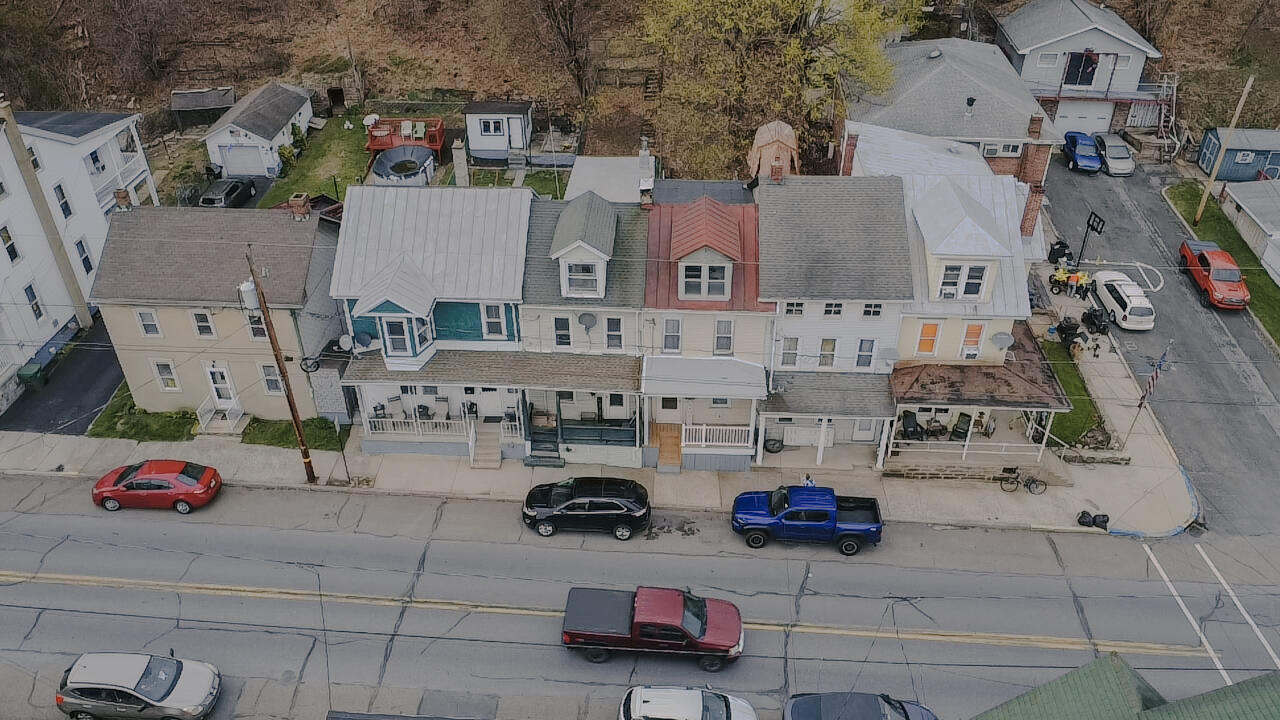 206 West Main Street Tremont, PA 17981 - Photo 2 of 13 an aerial view of multiple houses with outdoor space