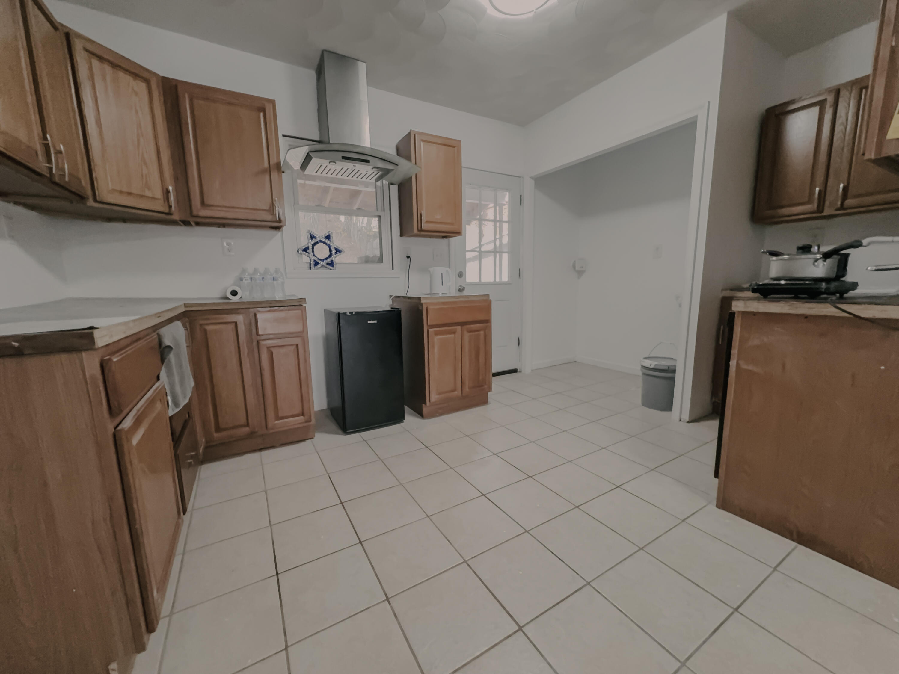 206 West Main Street Tremont, PA 17981 - Photo 6 of 13 a kitchen with refrigerator and cabinets