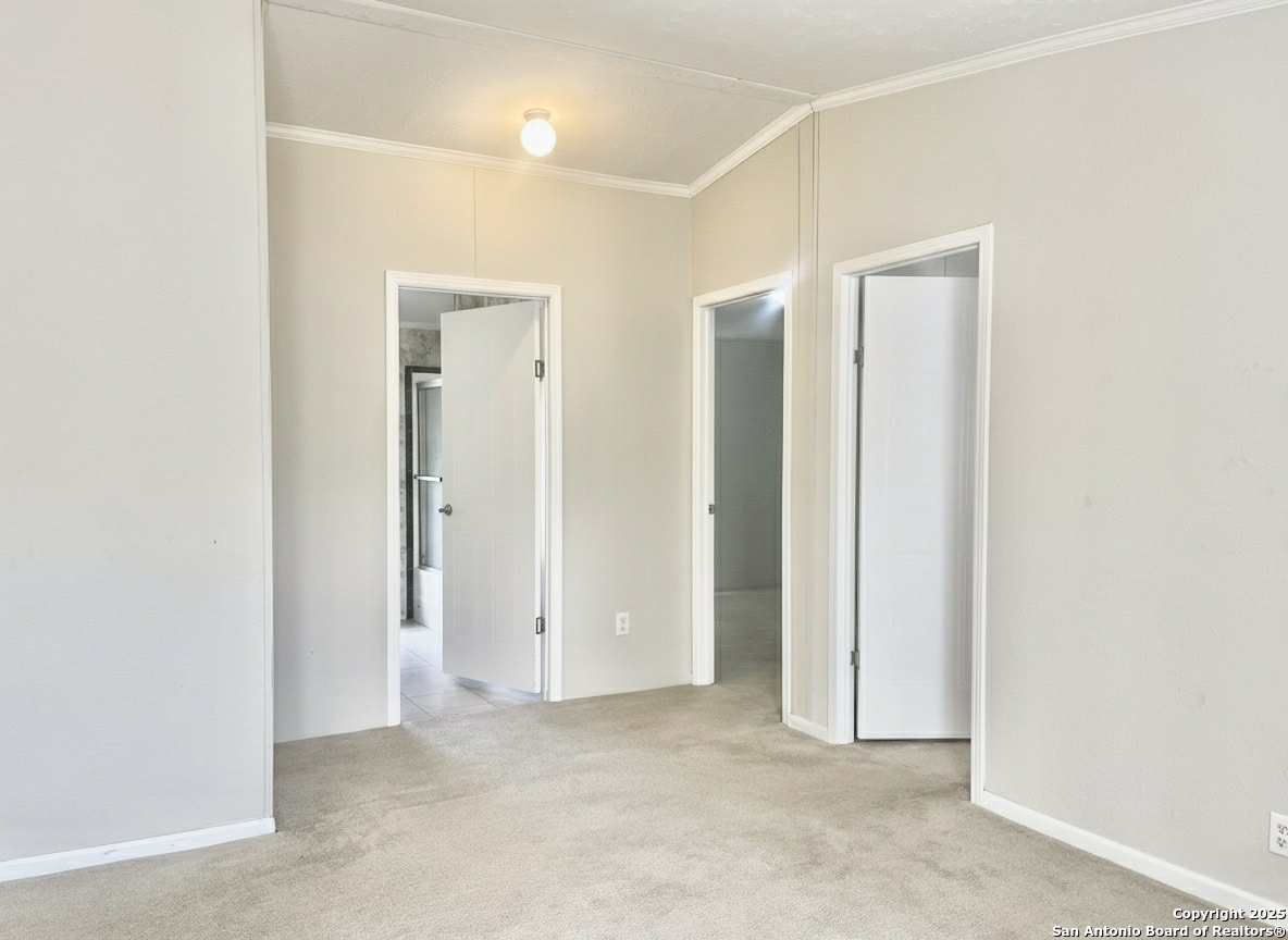 202 South 10th Christine, TX 78012 - Photo 17 of 28 an empty room with closet