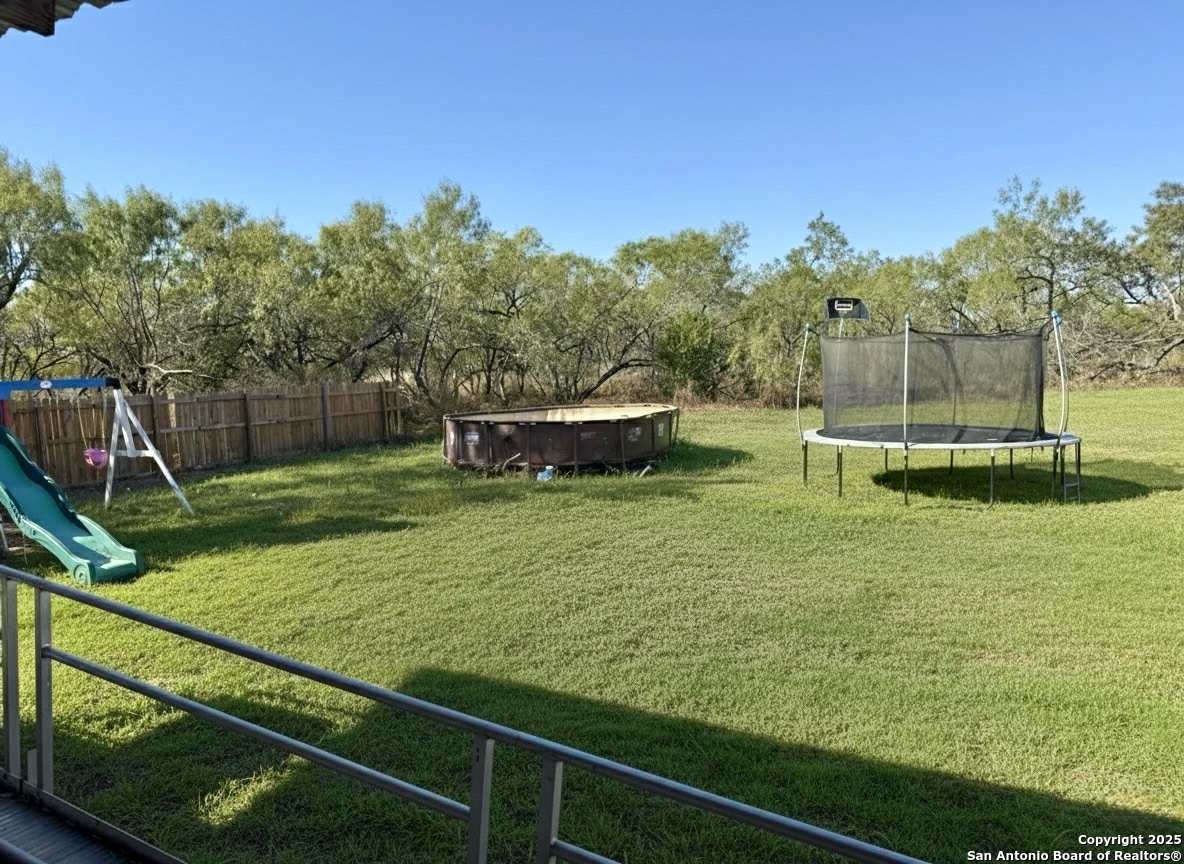 202 South 10th Christine, TX 78012 - Photo 27 of 28 a view of a backyard with sitting area