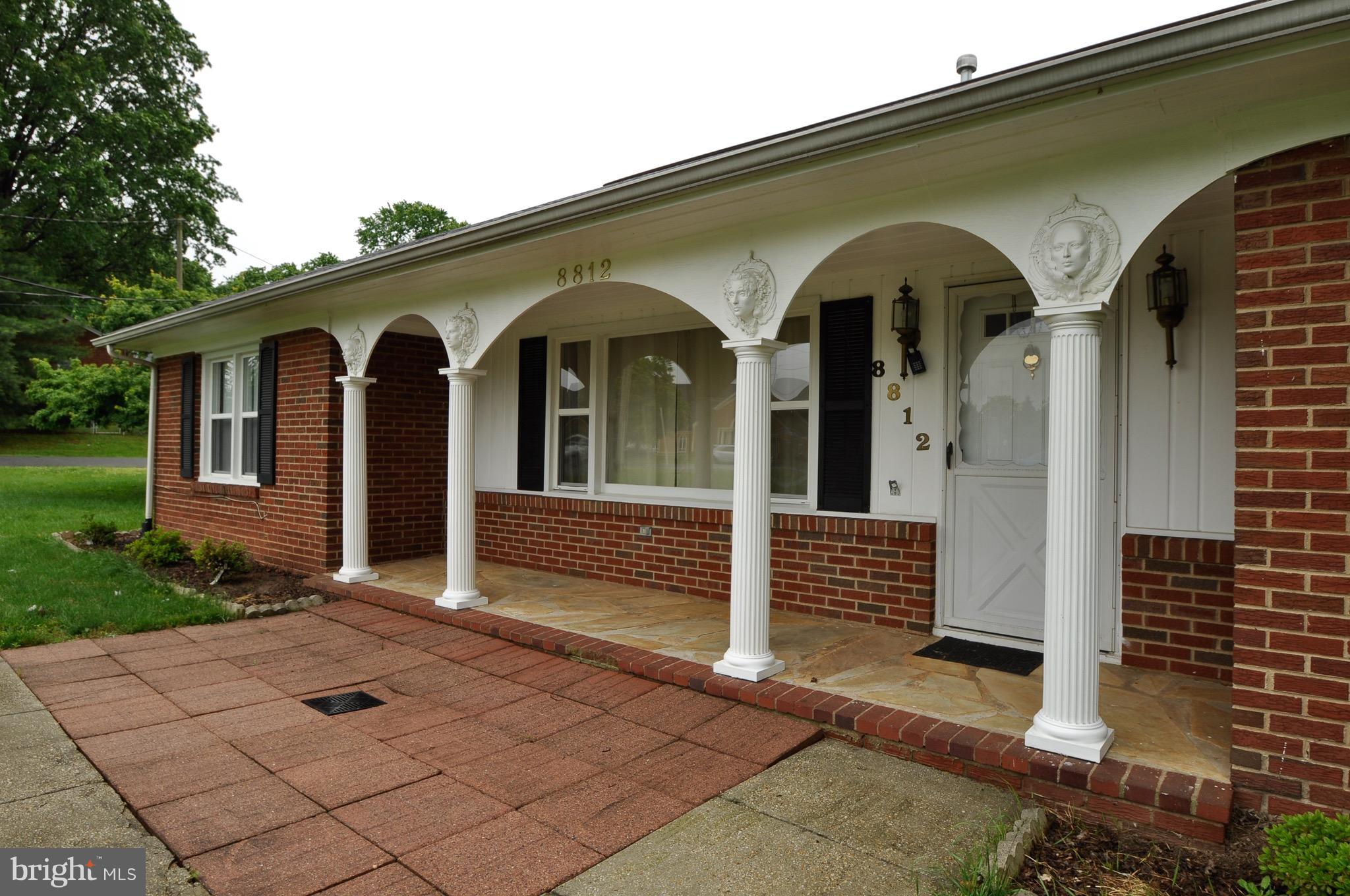 8812 Sudley Road Manassas, VA 20110 - Photo 2 of 30 Impressive front entrance