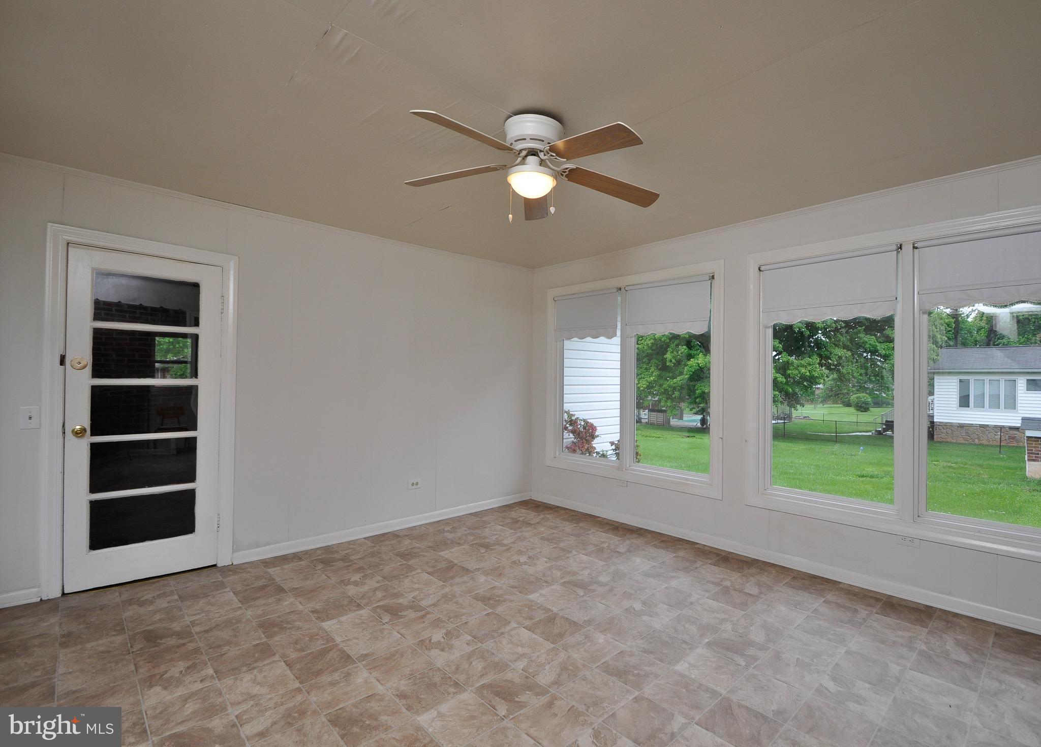 8812 Sudley Road Manassas, VA 20110 - Photo 13 of 30 Sunroom with tons of windows