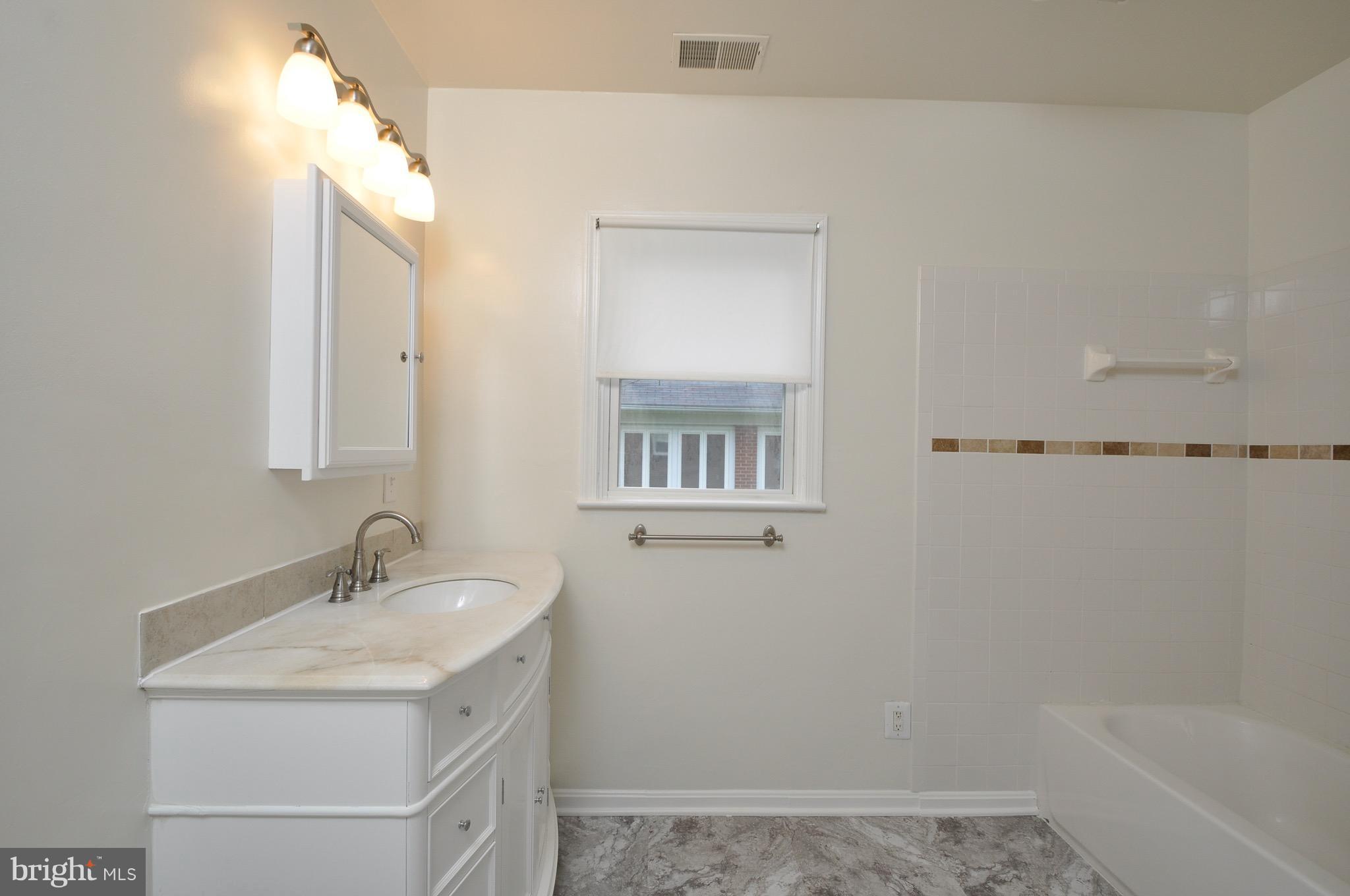 8812 Sudley Road Manassas, VA 20110 - Photo 25 of 30 Remodeled hall bath