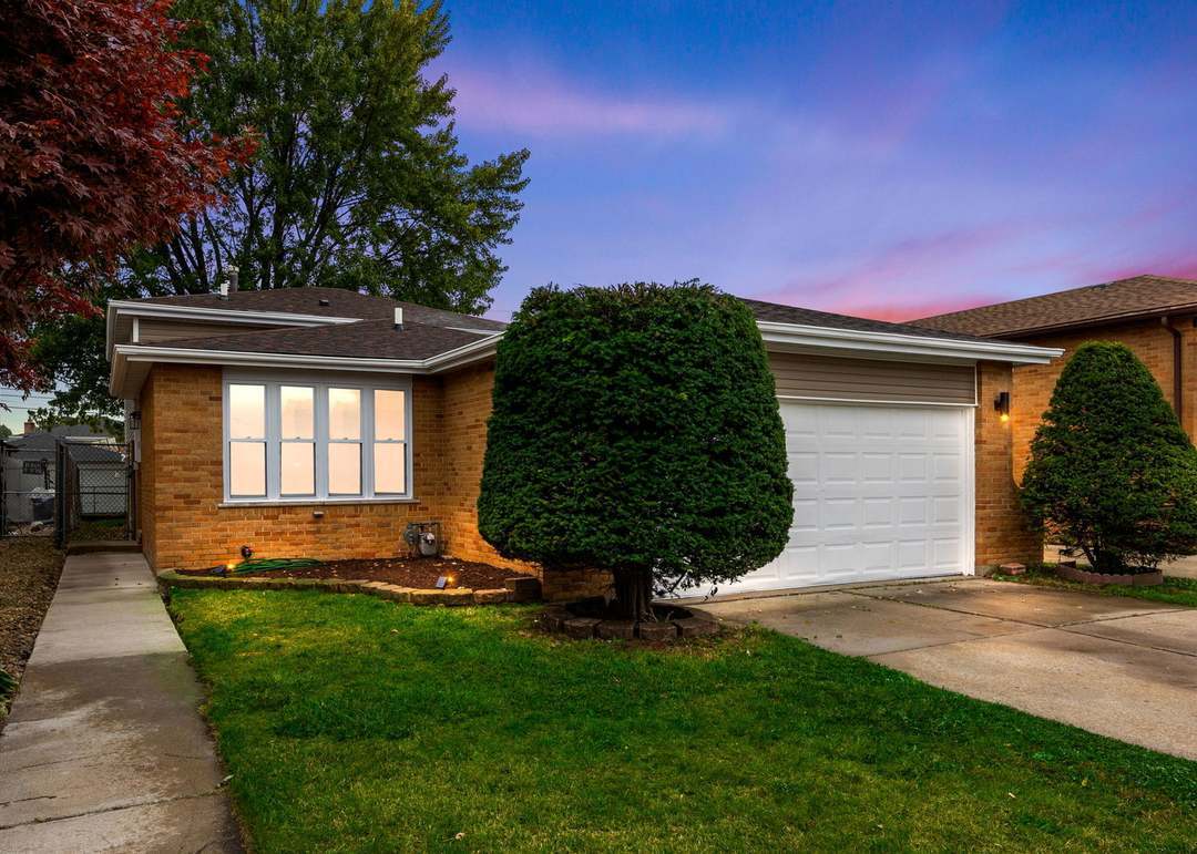 1119 Harding Avenue Calumet City, IL 60409 - Photo 11 of 11 a front view of a house with a yard