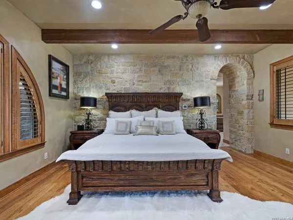 a table room with a wine shelf and cabinets