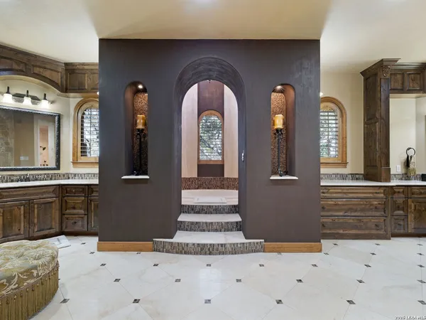 a view of living room with furniture and a fireplace