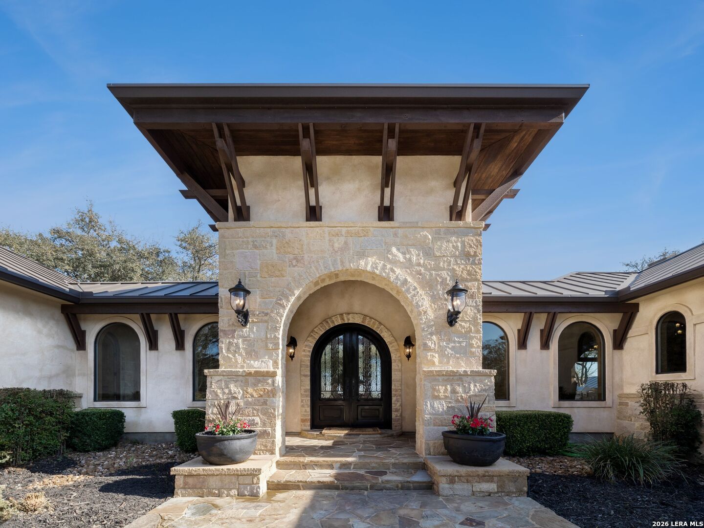 14454 Santa Rita Helotes, TX 78023 - Photo 4 of 70 a front view of a house with garden