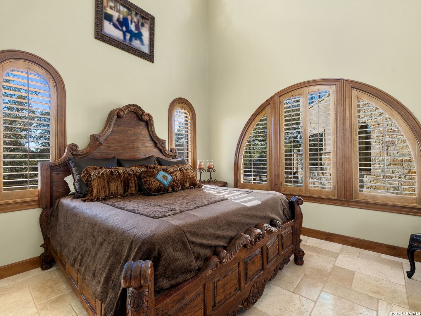 14454 Santa Rita Helotes, TX 78023 - Photo 47 of 70 a bedroom with a bed and a large window