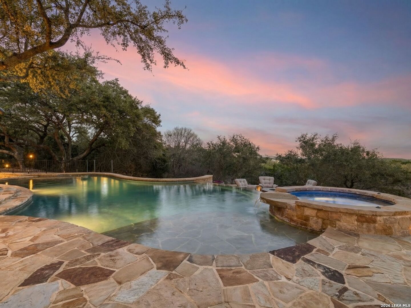 14454 Santa Rita Helotes, TX 78023 - Photo 66 of 70 a view of a swimming pool with a yard