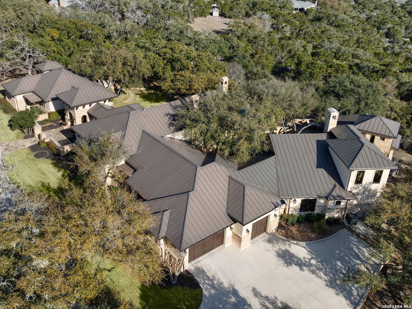 14454 Santa Rita Helotes, TX 78023 - Photo 68 of 70 an aerial view of a house with yard and parking space